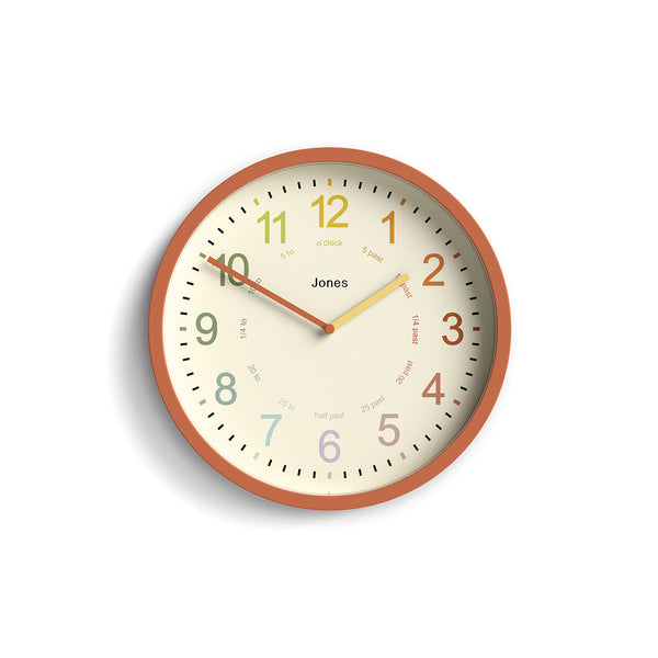 Kids wall clock by Jones Clocks in terracotta orange with a multi-coloured, easy-to-read dial - JDRAG180TO