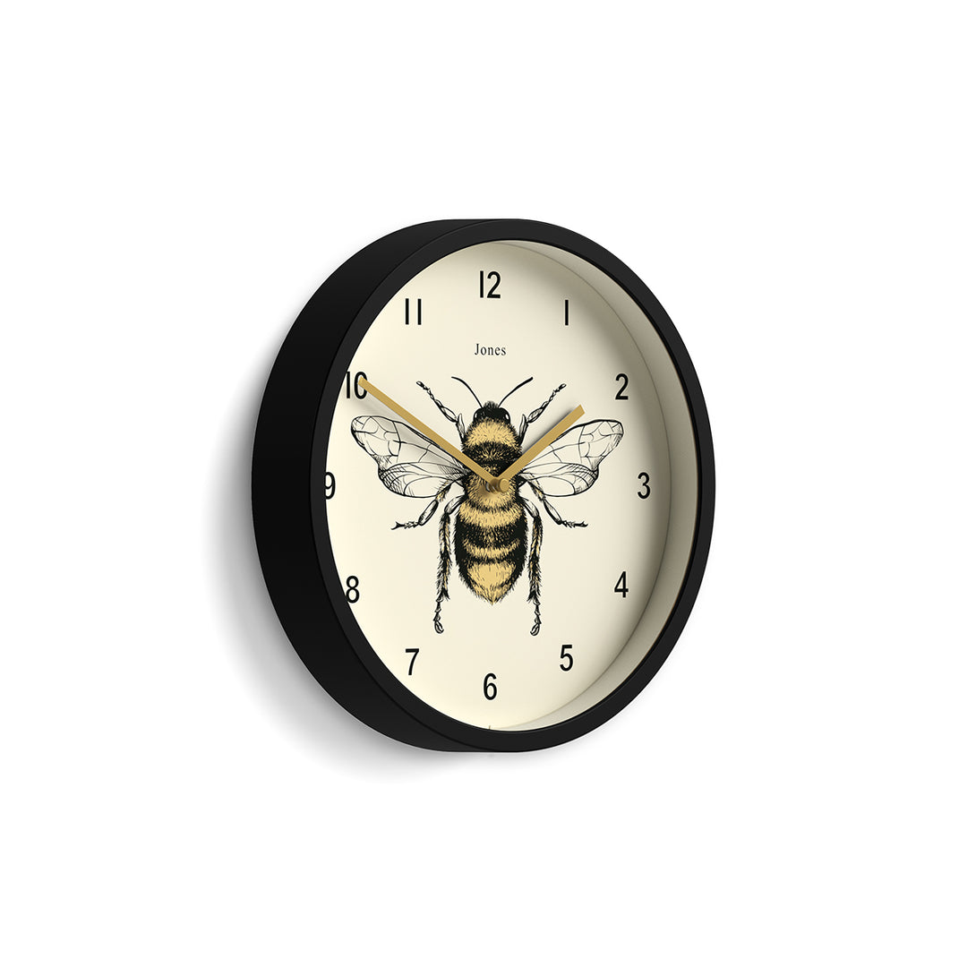 Side view - Bee wall clock by Jones Clocks with a black case and modern bee dial - JDRAG277K