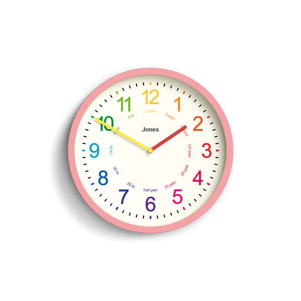 Kids wall clock by Jones Clocks in pink with a multi-coloured, easy-to-read dial - JDRAG73MPK