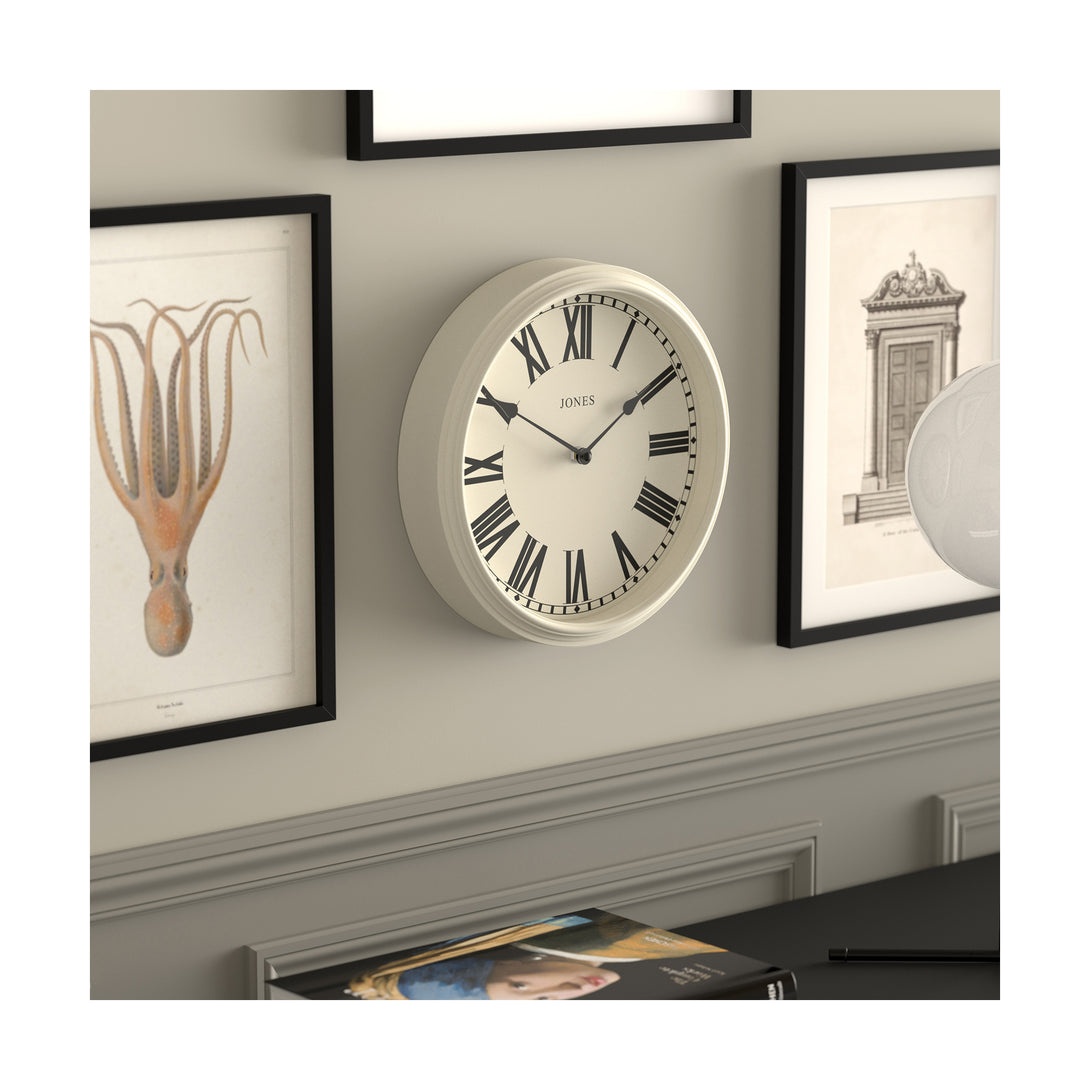 Hackney wall clock by Jones Clocks in white with a decorative case and classic Roman numeral dial - JHAC1LW