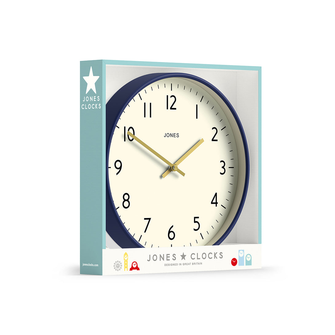 Packaging - Studio wall clock by Jones Clocks in midnight blue with an easy-to-read and minimalistic dial an gold effect hands - JPEN52PEBL