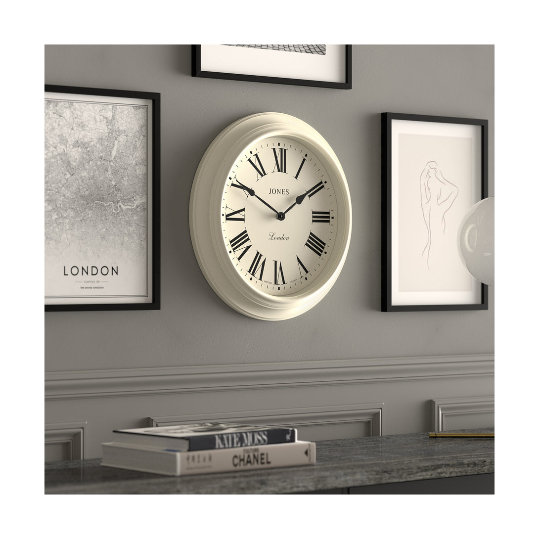 Gallery wall skew - Large Supper Club wall clock by Jones Clocks. A classic cream case with a Roman Numeral dial and black spade hands - JSUP319LW