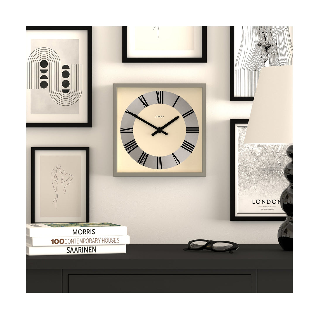 Box wall clock by Jones Clocks in grey with a circular Roman Numeral dial on a silver disk - JBOX230PGY