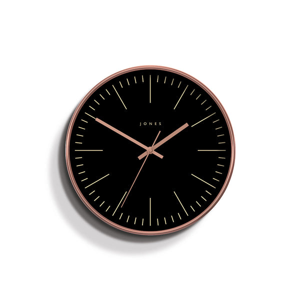 Modern Studio wall clock by Jones Clocks in a copper effect with a reverse black marker dial and copper hands