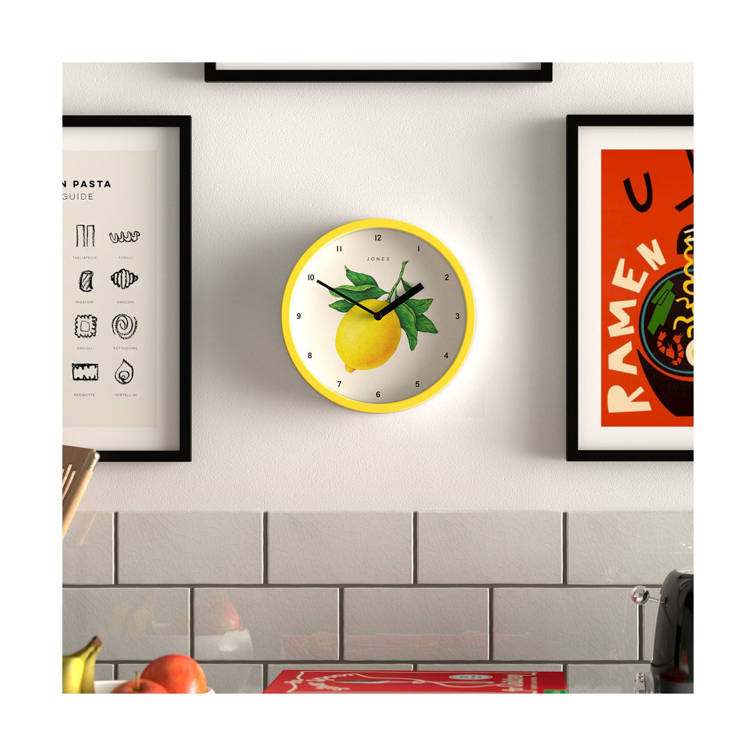 Lemon wall clock by Jones clocks in yellow with a decorative lemon dial - JFOX104CY