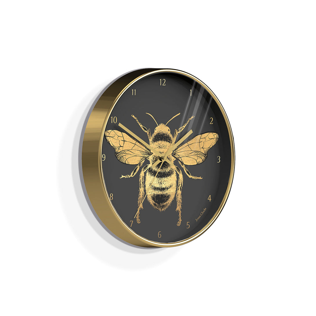 Side view of the Academy gold Bee wall clock by Jones Clocks with a gold foil and grey dial - JACA357PB