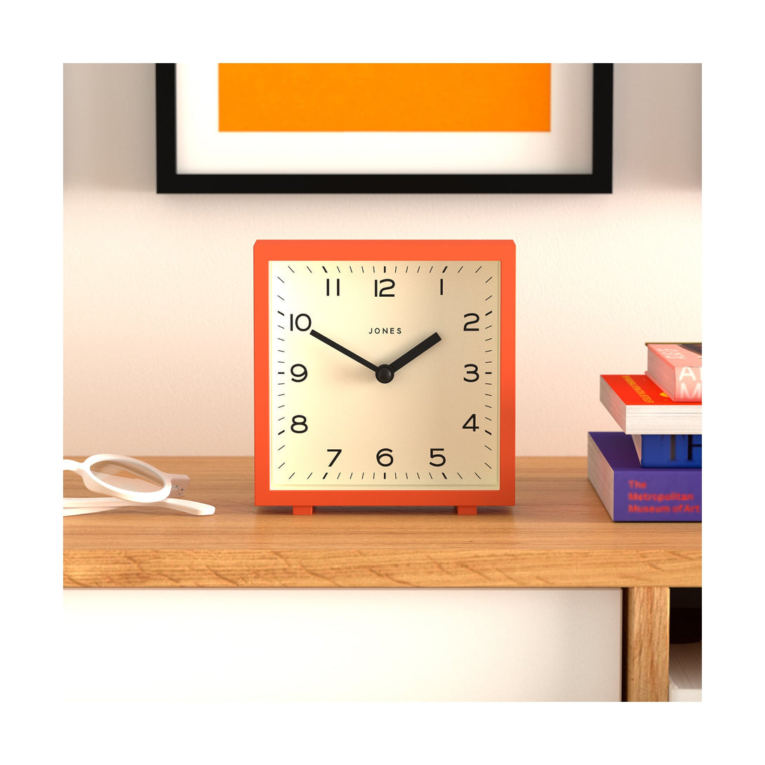 Disco mantel clock by Jones Clocks in orange with an Arabic dial - JDCO132PO