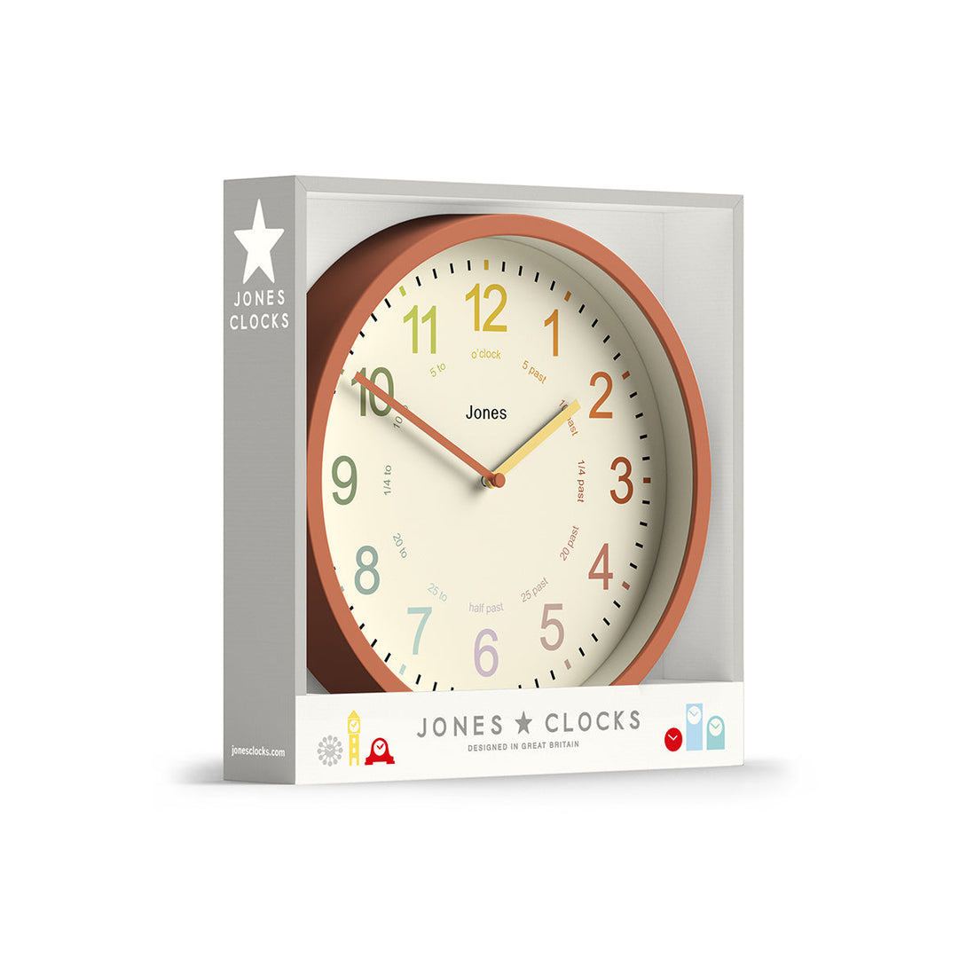Kids wall clock by Jones Clocks in terracotta orange with a multi-coloured, easy-to-read dial - JDRAG180TO