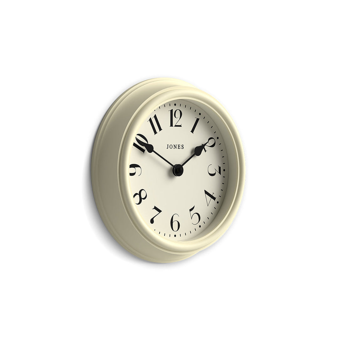 Side view - Frieze wall clock by Jones Clocks in cream with classic Arabic dial and spade hands - JFRZ111C