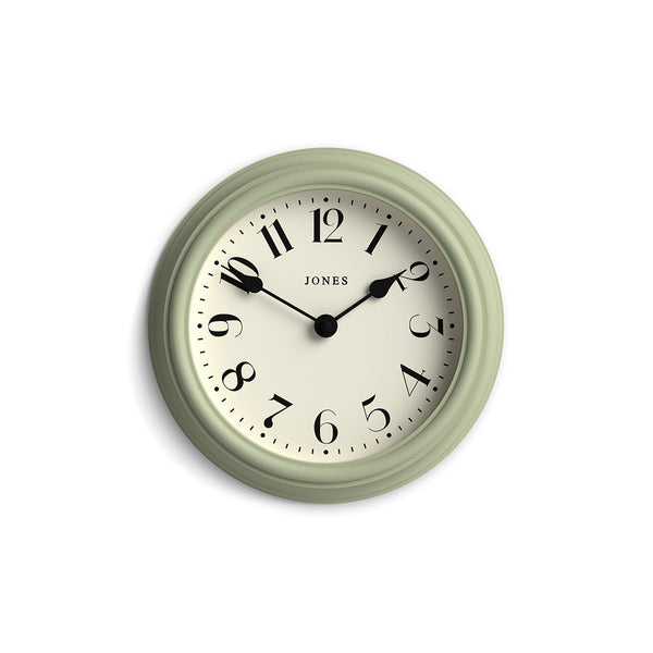 Frieze wall clock by Jones Clocks in sage green with classic Arabic dial and spade hands - JFRZ111DS
