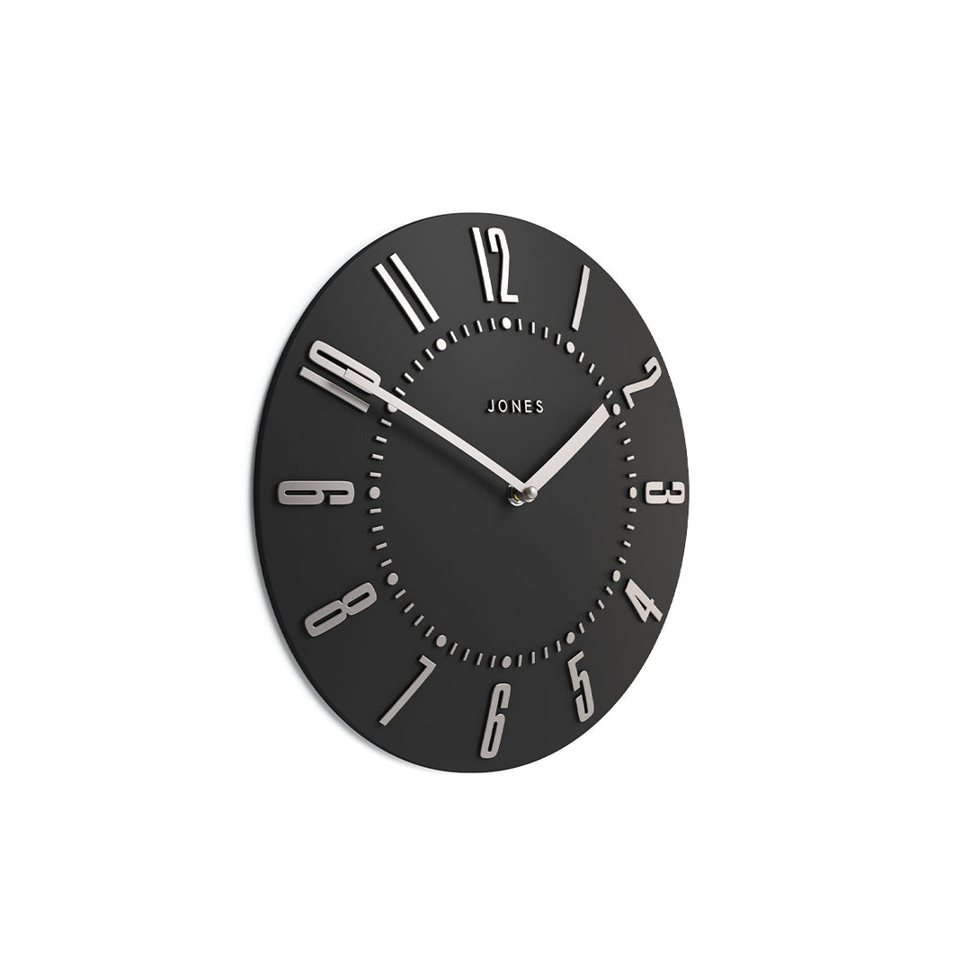 Side view - Juke Convex wall clock by Jones Clocks in dark grey with a retro style silver dial - JJUKEBGYS30