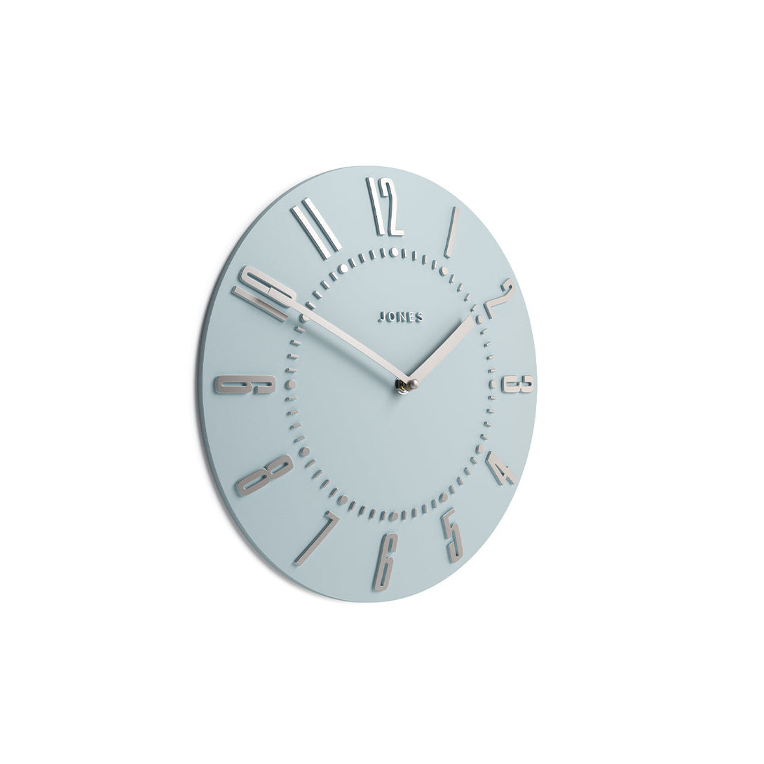 Side view - Juke Convex wall clock by Jones Clocks in pale blue with a retro style silver dial - JJUKECBLS30