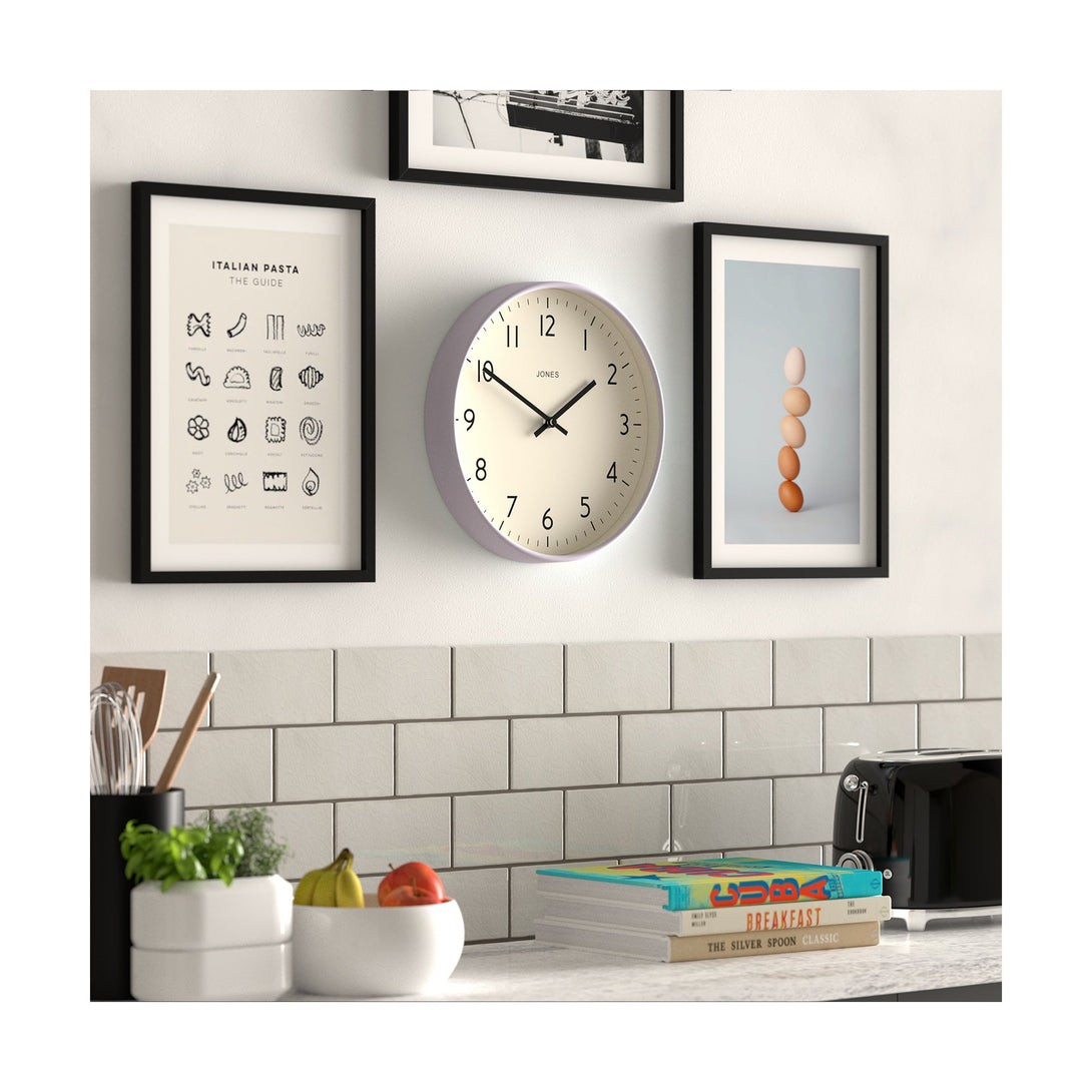 Skew kitchen - Studio wall clock by Jones Clocks in lavender with an easy-to-read and minimalistic dial - JPEN52LAV