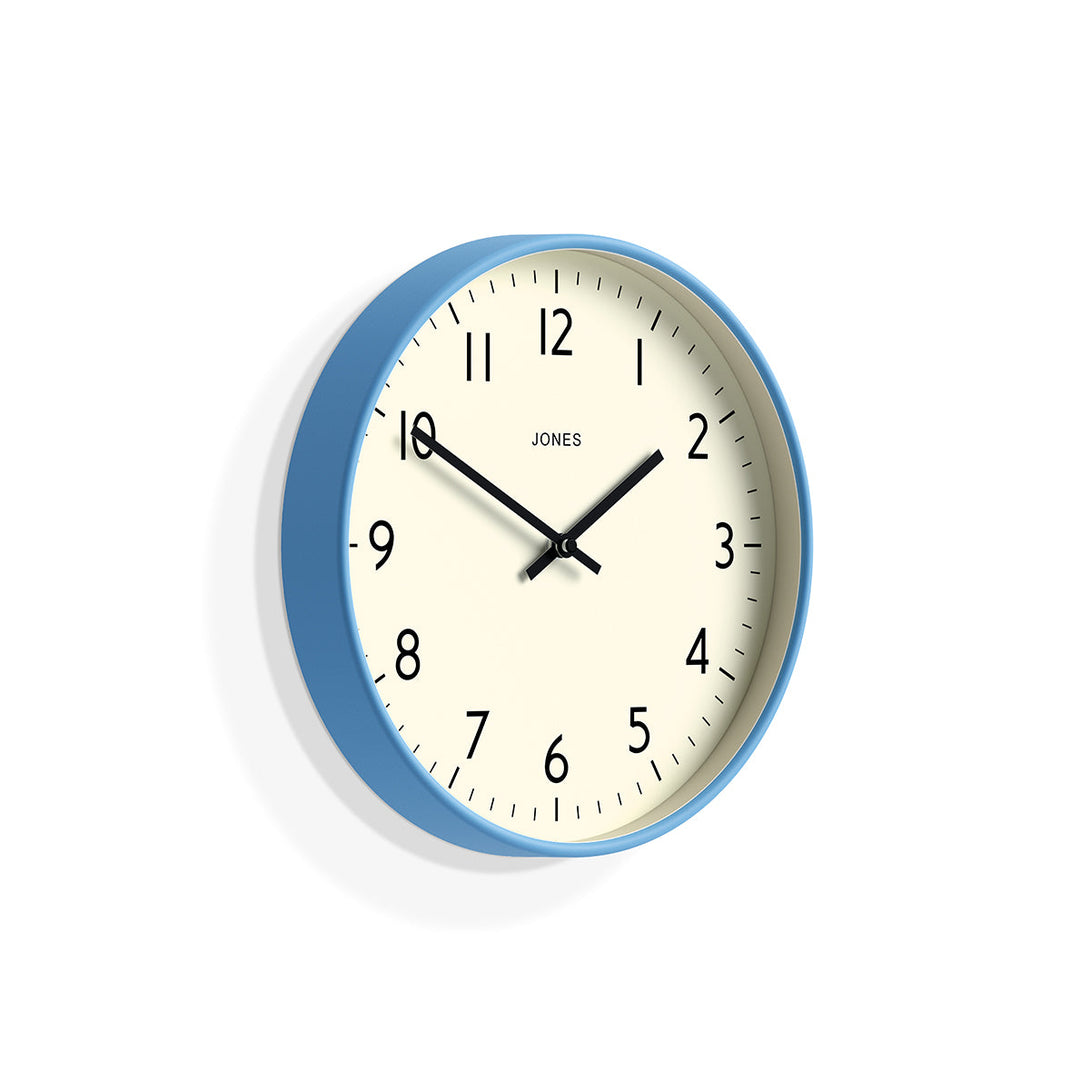 Skew - Studio wall clock by Jones Clocks in blue with an easy-to-read and minimalistic dial - JPEN52MBL