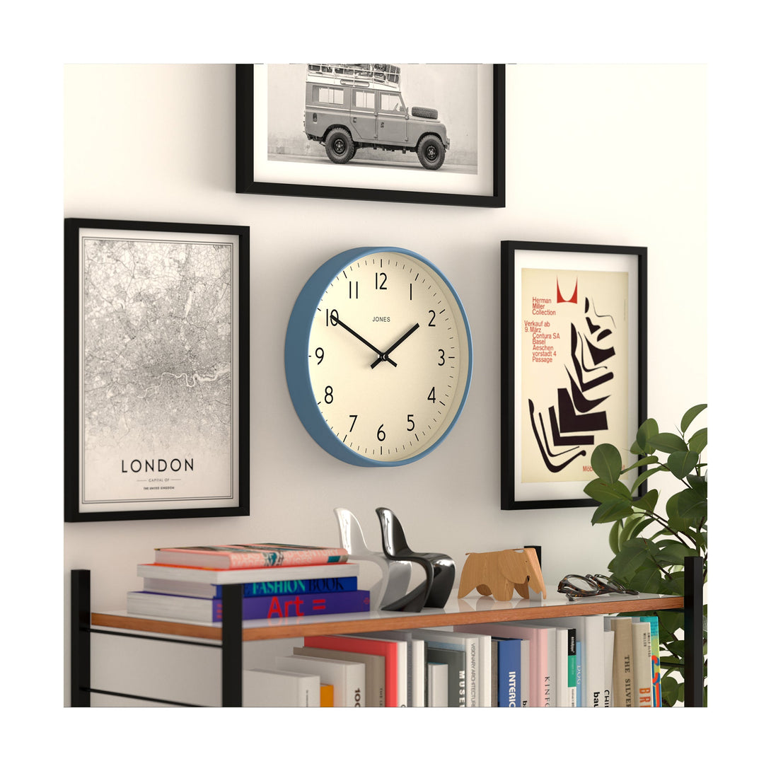 Skew - Studio wall clock by Jones Clocks in blue with an easy-to-read and minimalistic dial - JPEN52MBL