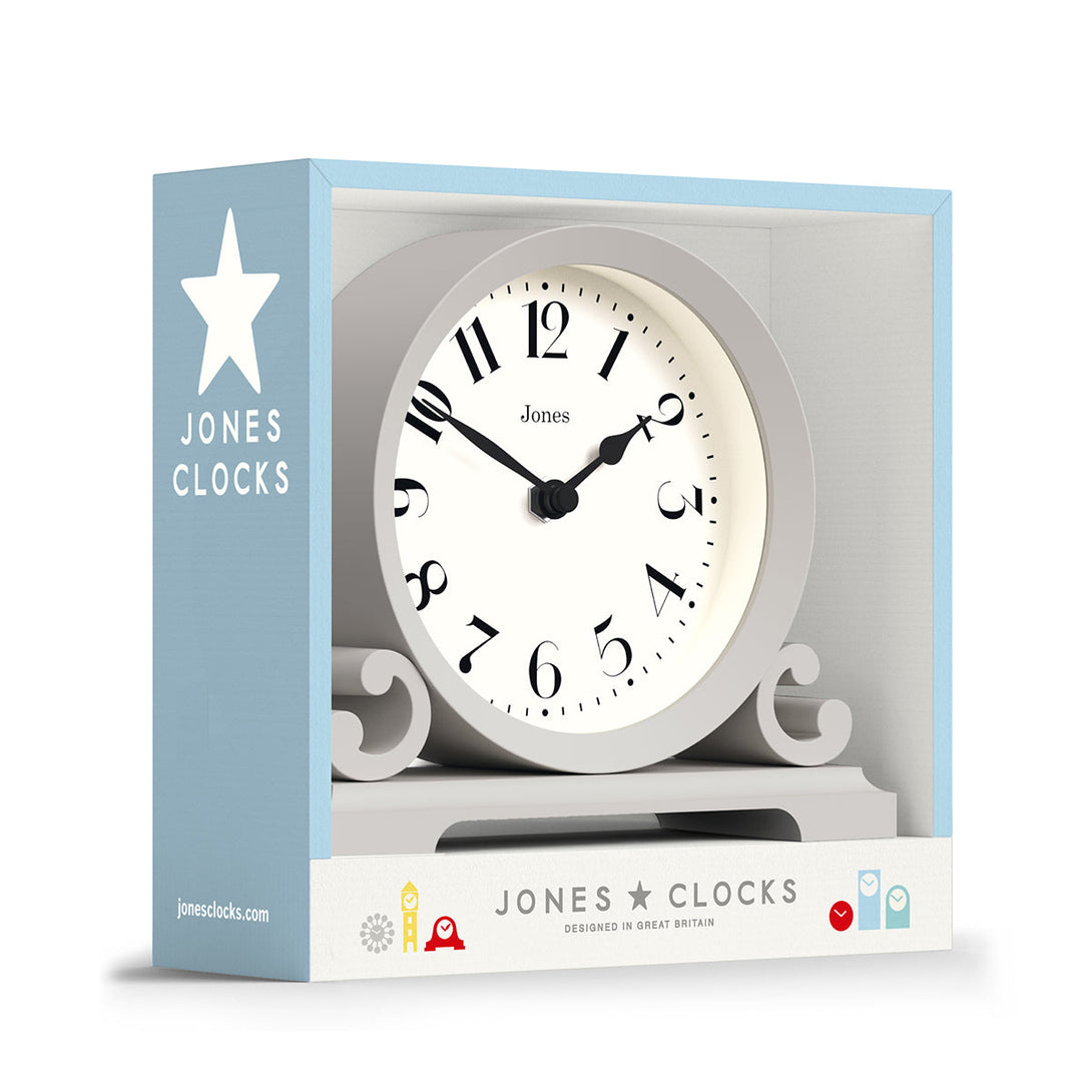 Packaging - Saloon decorative mantel clock by Jones Clocks in cloud grey with a modern stylistic Arabic dial and metal spade hands - JSAL192OGY