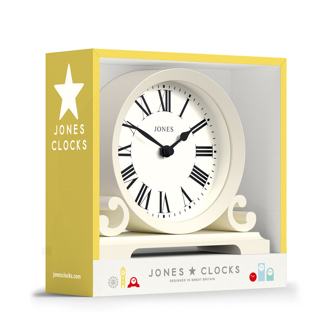 Packaging - Saloon decorative mantel clock by Jones Clocks in white linen with a modern stylistic Roman numeral dial and metal spade hands - JSAL319LW