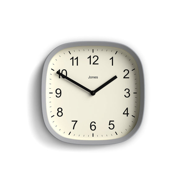 Front - Sprite wall clock By Jones Clocks with a rounded square case in a pale grey. Clear contemporary Arabic dial - JSPARV104CGY