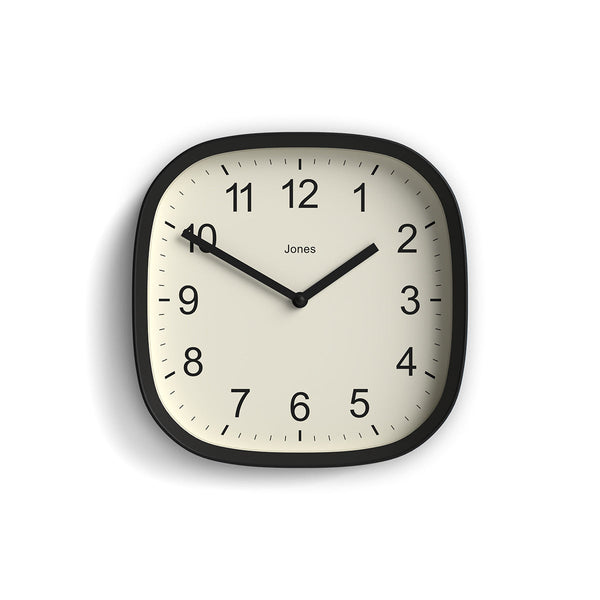 Front - Sprite wall clock By Jones Clocks with a rounded square case in a black. Clear contemporary Arabic dial - JSPARV104K