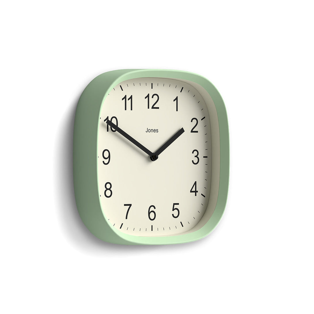 Skew - Sprite wall clock By Jones Clocks with a rounded square case in a mint green. Clear contemporary Arabic dial - JSPARV104NM