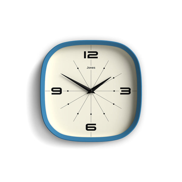 Front - Pulsar wall clock By Jones Clocks with a rounded square case in Mid Blue. Retro-inspired simplified dial - JSPARV179MBL