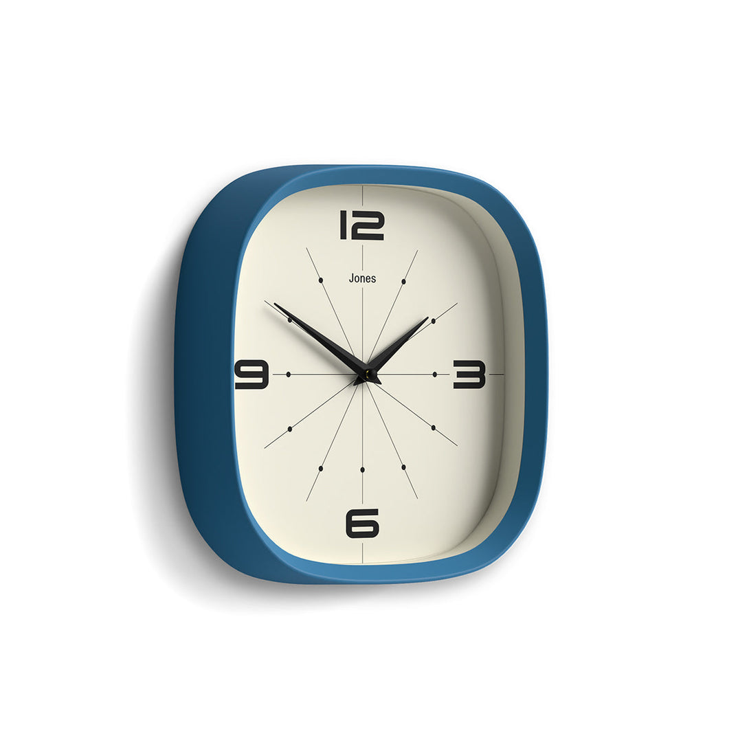 Skew - Pulsar wall clock By Jones Clocks with a rounded square case in Mid Blue. Retro-inspired simplified dial - JSPARV179MBL