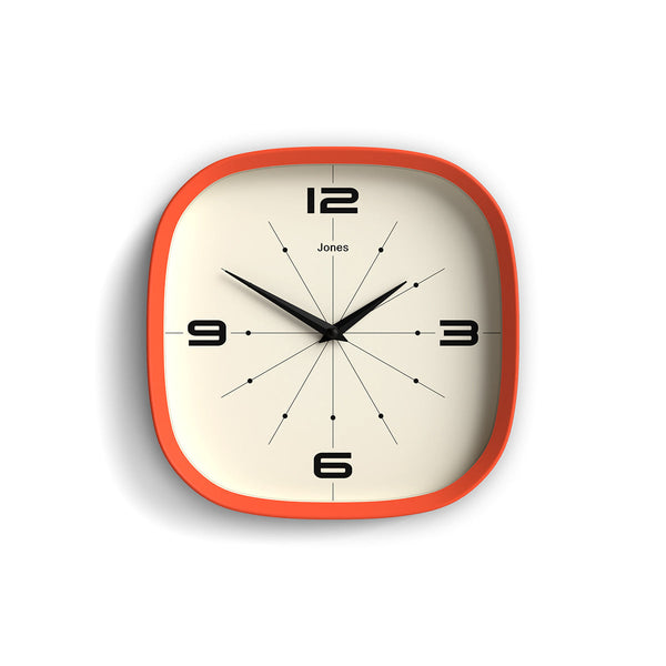 Front - Pulsar wall clock By Jones Clocks with a rounded square case in Pumpkin Orange. Retro-inspired simplified dial - JSPARV179PO