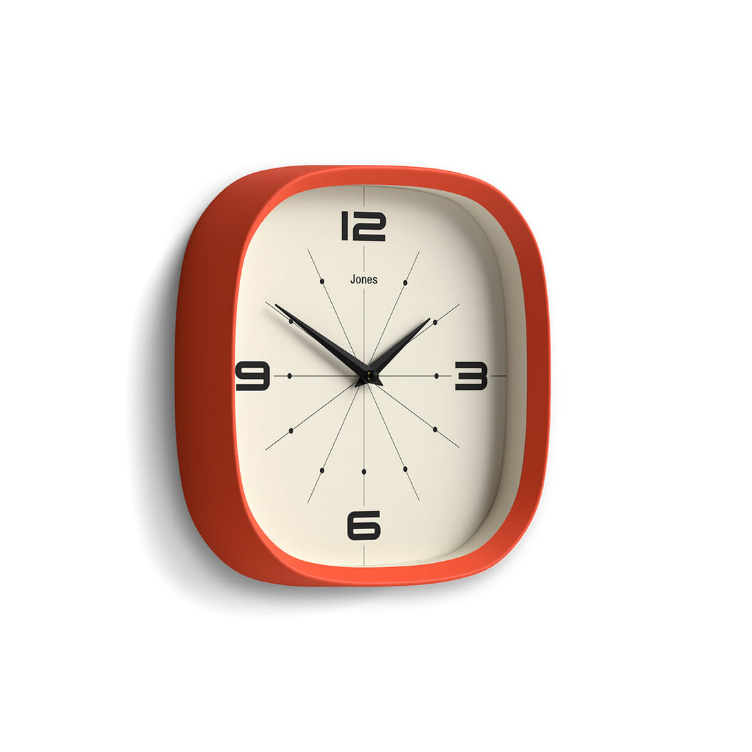 Skew - Pulsar wall clock By Jones Clocks with a rounded square case in Pumpkin Orange. Retro-inspired simplified dial - JSPARV179PO