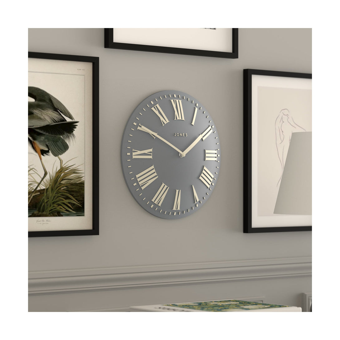 Skew living room - Strand convex wall clock by Jones Clocks. Prominent white Roman duals on a medium blue grey background, offering a modern look - JSTRFNLW30