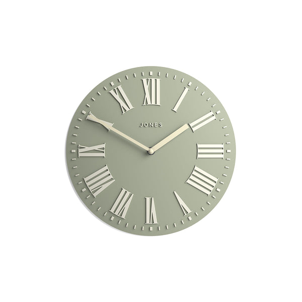 Front - Strand convex wall clock by Jones Clocks. Prominent white Roman duals on a sage green background, offering a modern look - JSTRSGLW30