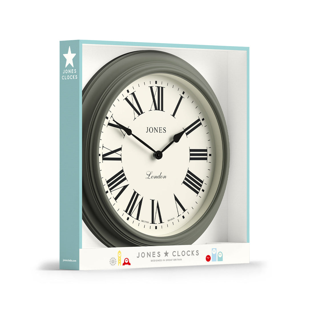 Packaging - Large Supper Club wall clock by Jones Clocks. A classic Moss Green case with a Roman Numeral dial and black spade hands - JSUP319ASG