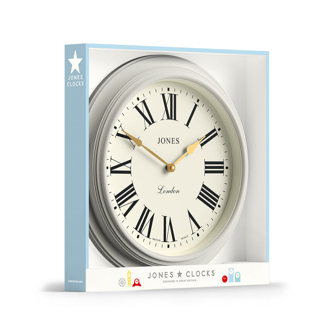 Packaging - Large Supper Club wall clock by Jones Clocks. A classic powder grey case with a Roman Numeral dial and 'gold effect' spade hands - JSUP319LGYII