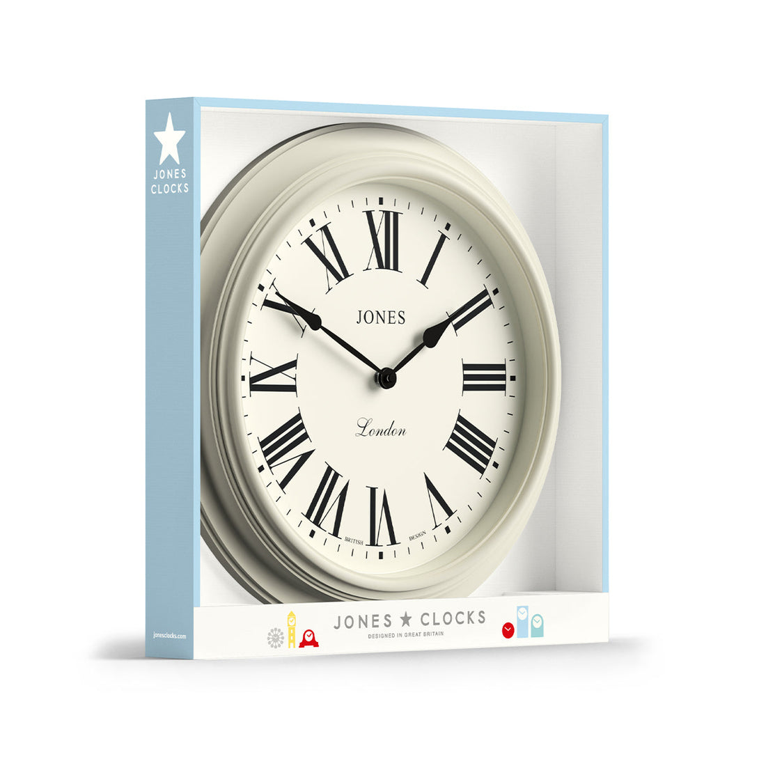 Packaging - Large Supper Club wall clock by Jones Clocks. A classic cream case with a Roman Numeral dial and black spade hands - JSUP319LW