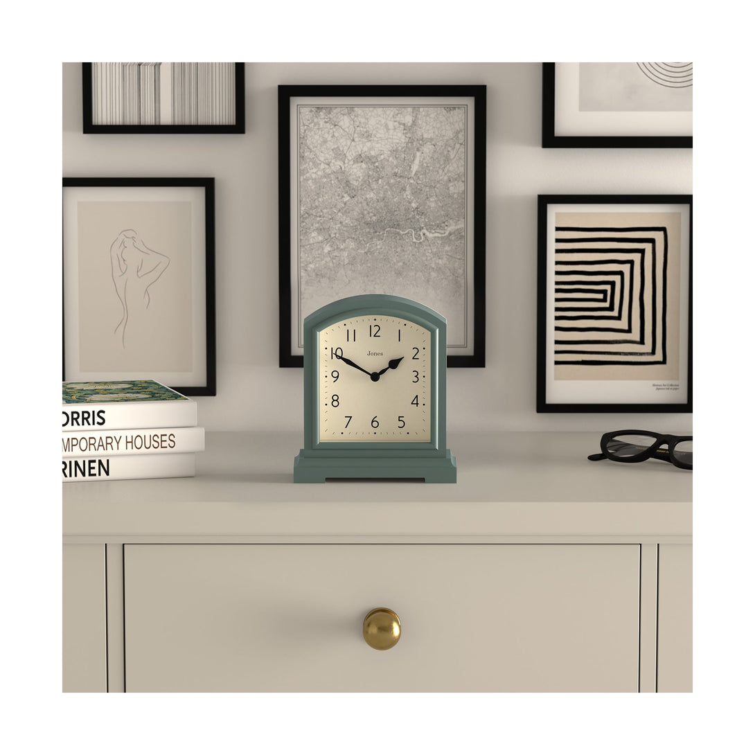 Style shot - Tavern mantel clock by Jones Clocks. A classic green case with an Arabic Numeral dial and black spade hands - JTAV243ASG