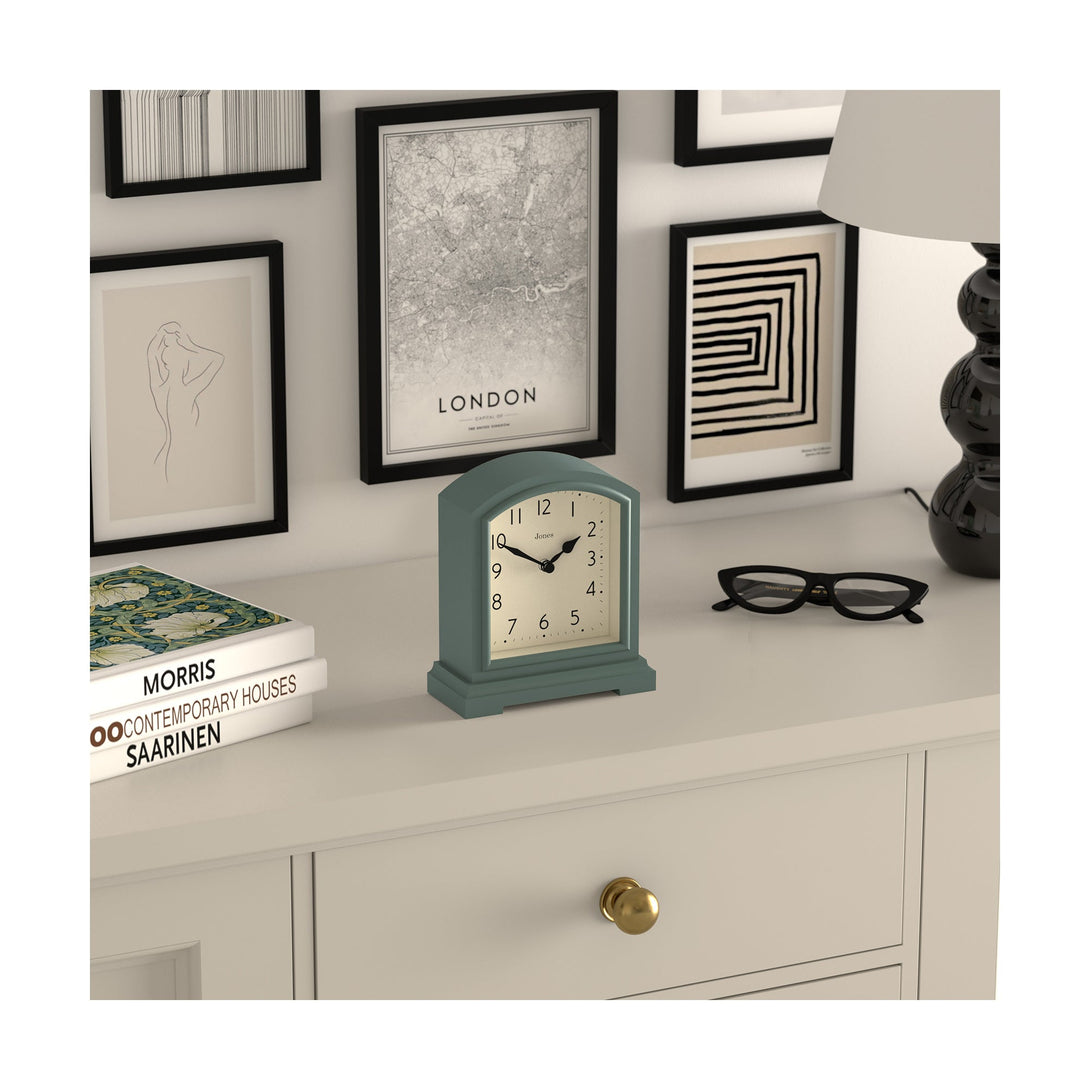 Style shot skew - Tavern mantel clock by Jones Clocks. A classic green case with an Arabic Numeral dial and black spade hands - JTAV243ASG