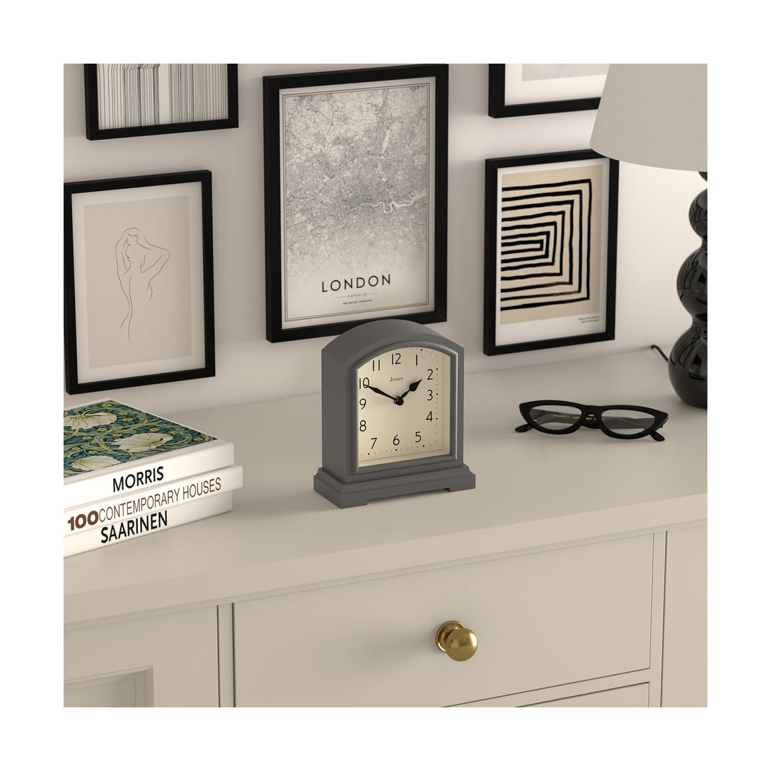 Style shot skew - Tavern mantel clock by Jones Clocks. A classic blizzard grey case with an Arabic Numeral dial and black spade hands - JTAV243BGY