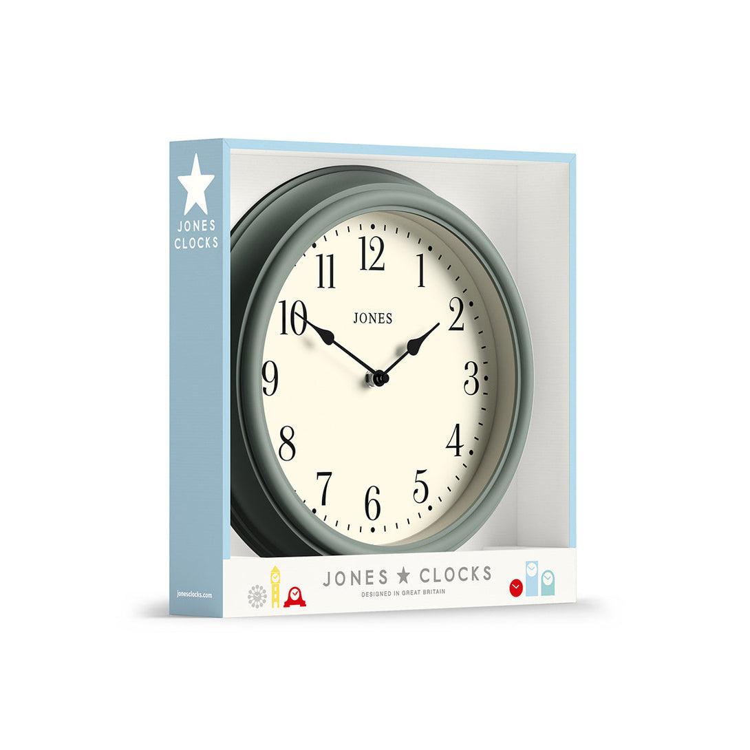 Packaging - Venetian wall clock by Jones Clocks. An Arabic dial with traditional spade hands, inside a decorative 'mole grey' beige case - JVEN120ASG