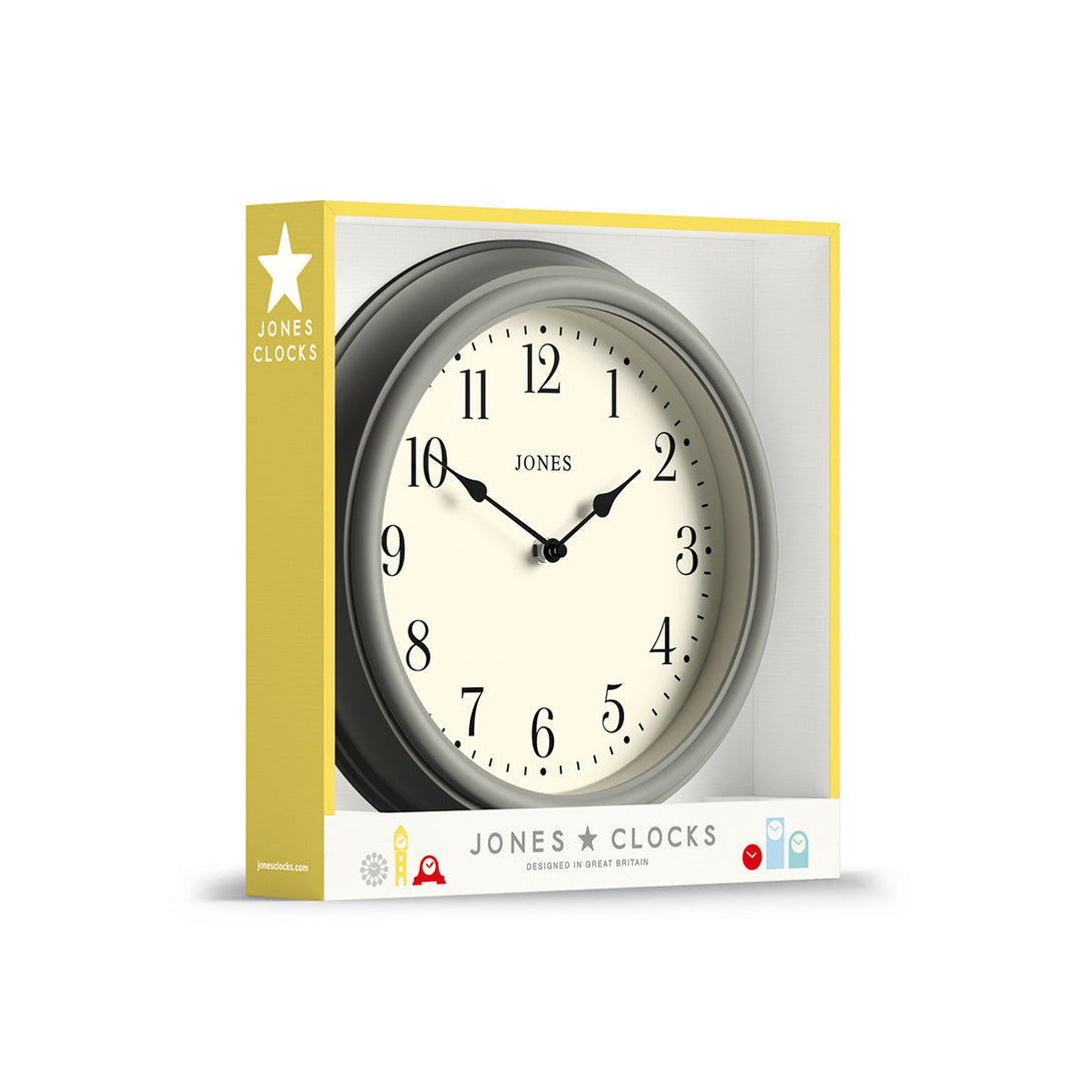 Packaging - Venetian wall clock by Jones Clocks. An Arabic dial with traditional spade hands, inside a decorative pepper grey case - JVEN120PGY