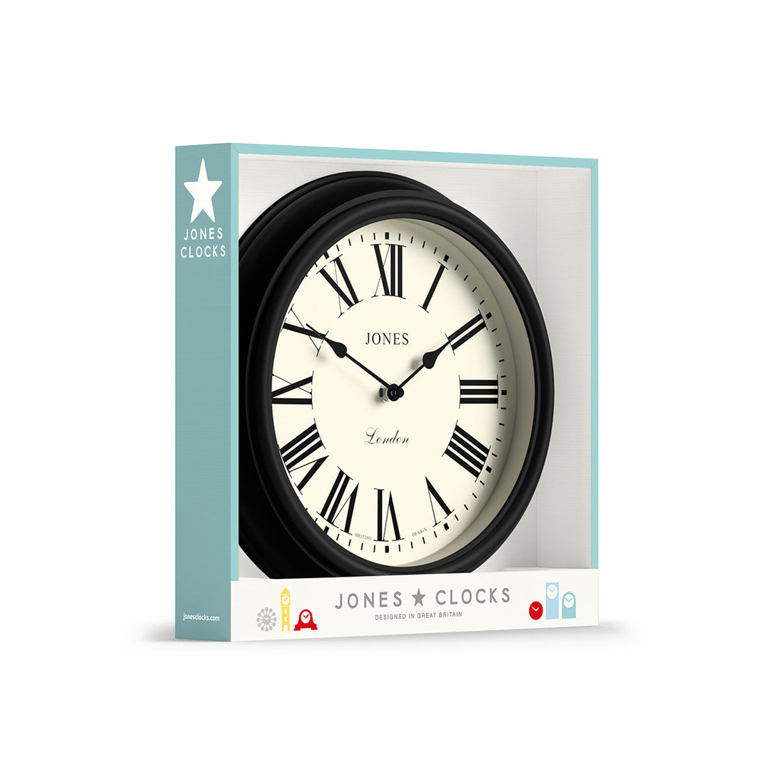 Packaging - Venetian wall clock by Jones Clocks. A classic Roman numeral dial with traditional spade hands, inside a decorative black case - JVEN319K