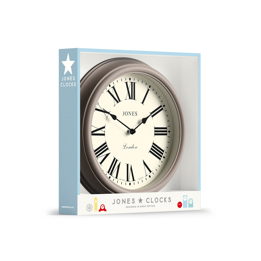 Packaging - Venetian wall clock by Jones Clocks. A classic Roman numeral dial with traditional spade hands, inside a decorative 'mole grey' beige case - JVEN319ST