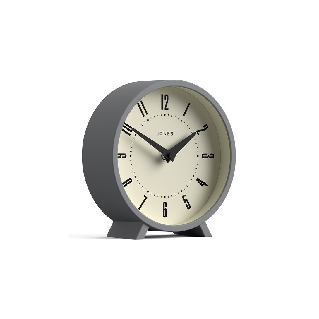 Skew - Venus mantel clock by Jones Clocks. A contemporary mantel or desk clock in a grey case with triangulation hands, with a retro Arabic dial - JVNU214CGY