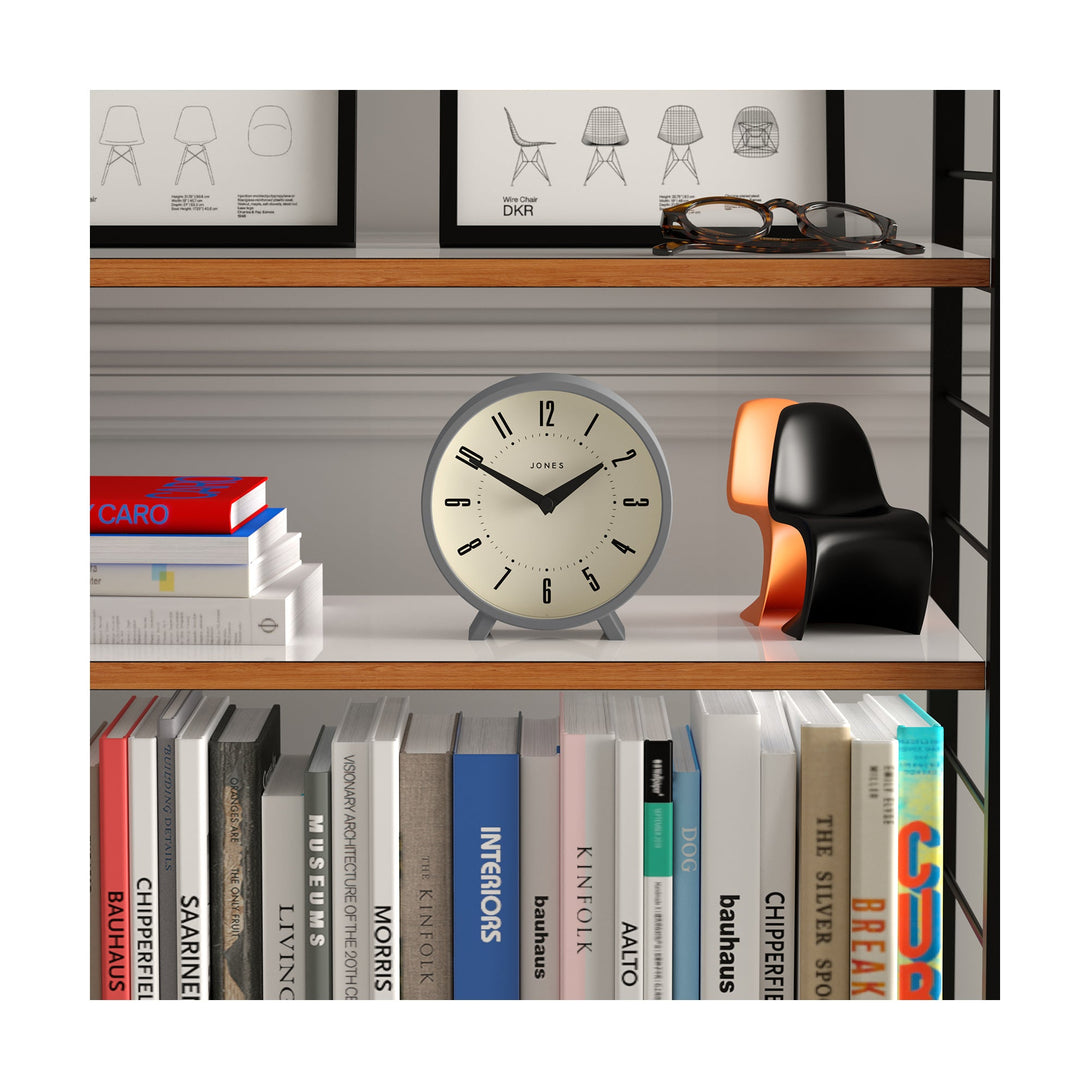 Shelving - Venus mantel clock by Jones Clocks. A contemporary mantel or desk clock in a grey case with triangulation hands, with a retro Arabic dial - JVNU214CGY