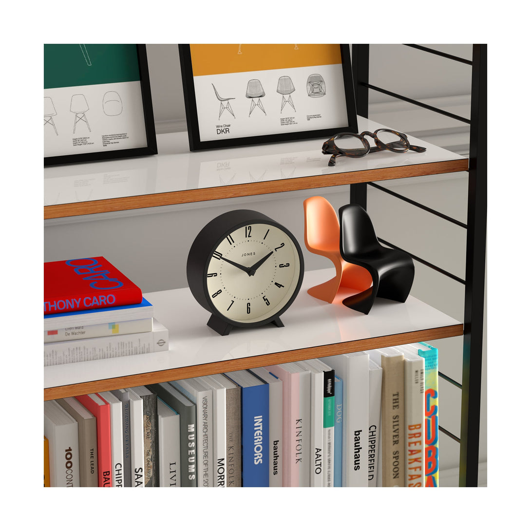 Shelving skew - Venus mantel clock by Jones Clocks. A contemporary mantel or desk clock in a black case with triangulation hands, with a retro Arabic dial - JVNU214K
