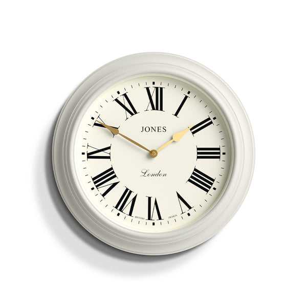 Front - Large Supper Club wall clock by Jones Clocks. A classic powder grey case with a Roman Numeral dial and 'gold effect' spade hands - JSUP319LGYII