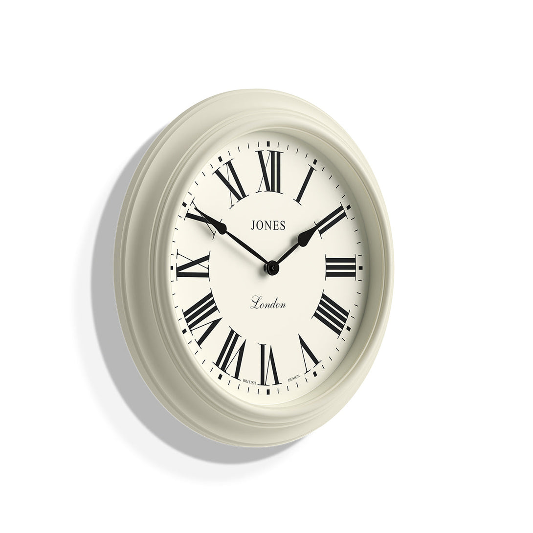 Skew - Large Supper Club wall clock by Jones Clocks. A classic cream case with a Roman Numeral dial and black spade hands - JSUP319LW