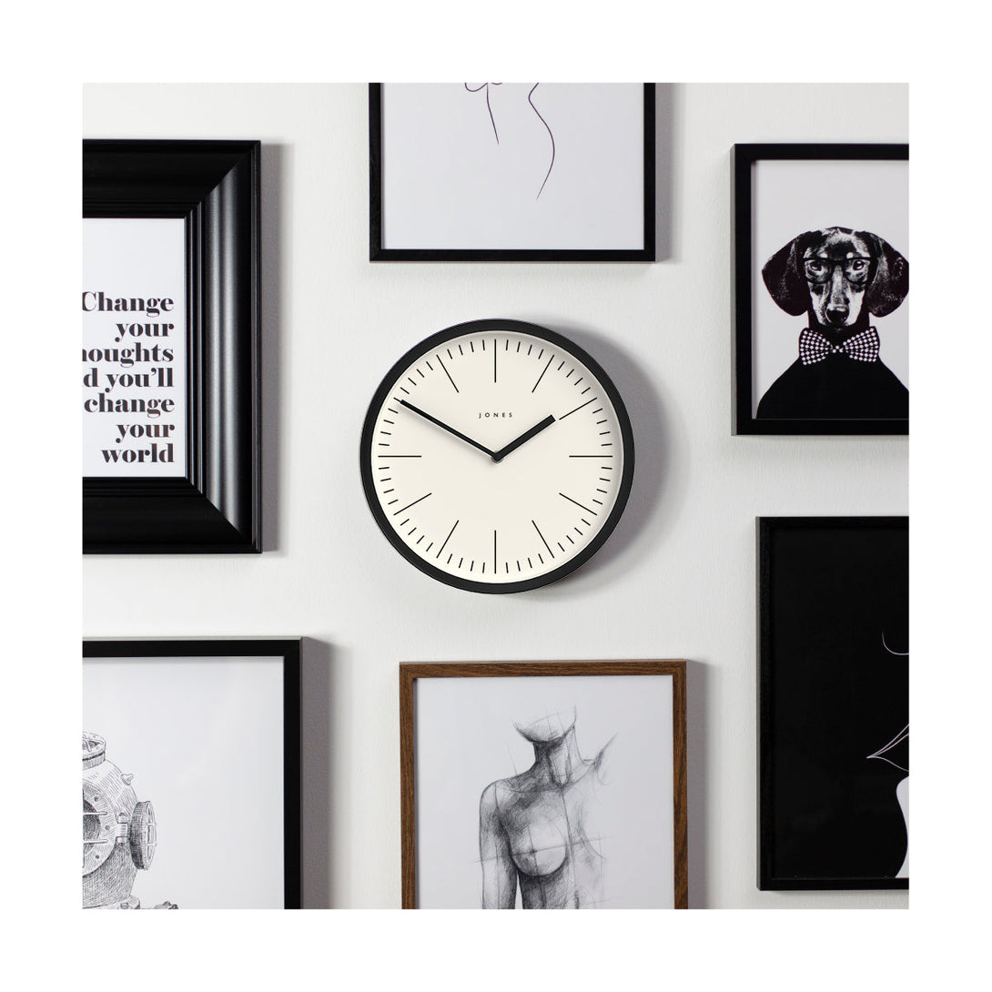 Heartbeat wall clock by Jone Clocks in black with a contemporary and minimalist marker dial and linear metal hands - JHEAR102K