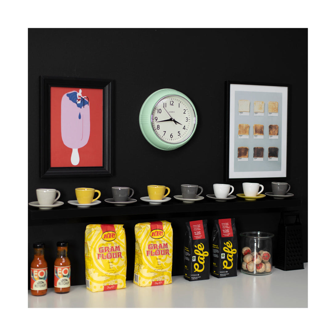 Ketchup retro wall clock by Jones Clocks in mint green with vintage-influenced dial, in a kitchen setting - JKETC223NM