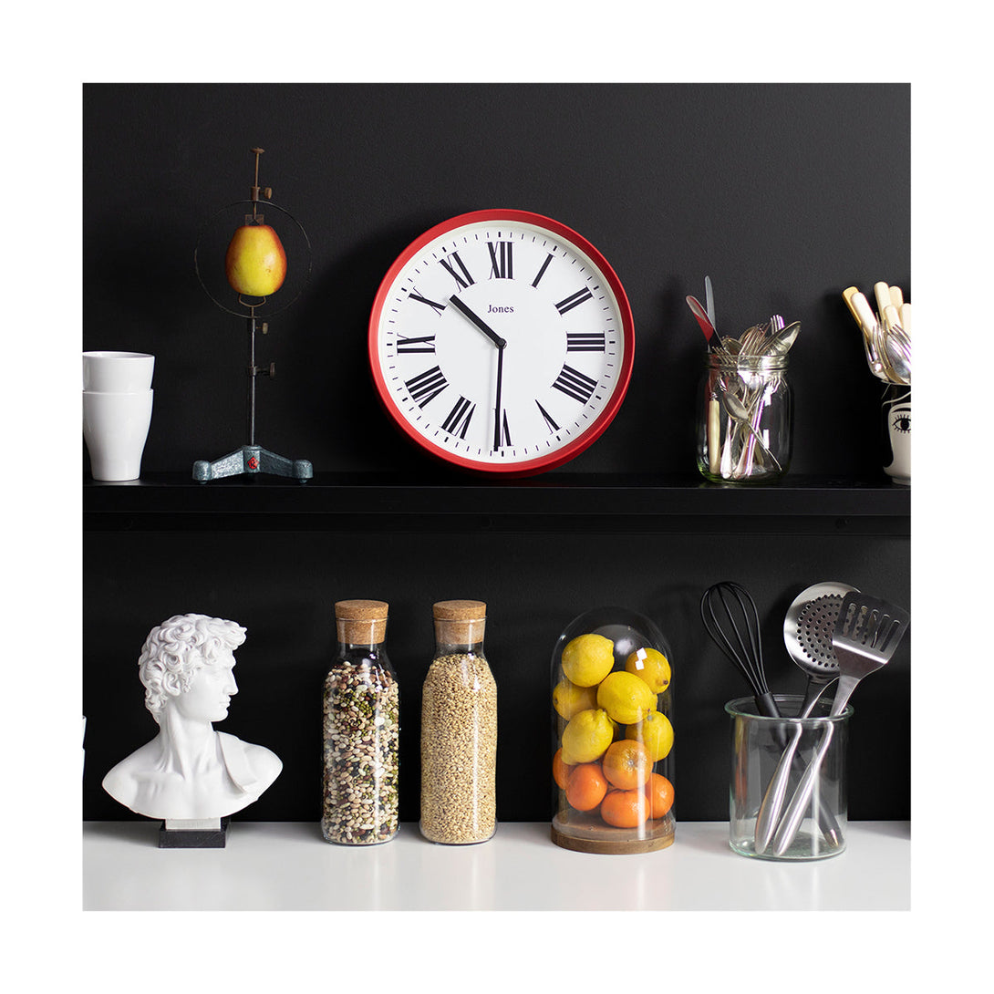 Kitchen wall - Heartbeat wall clock by Jones Clocks in Red with a modern Roman numeral dial and straight metal hands - JHEAR173R