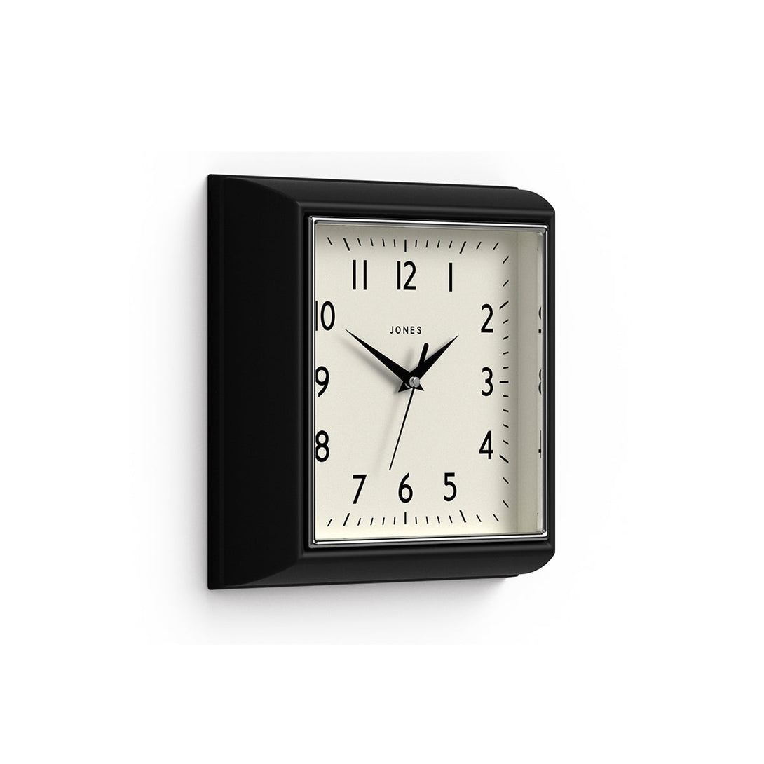 Skew - Small square Mustard wall clock by Jones Clocks in Black with a Arabic dial and metal hands - JMUST741K