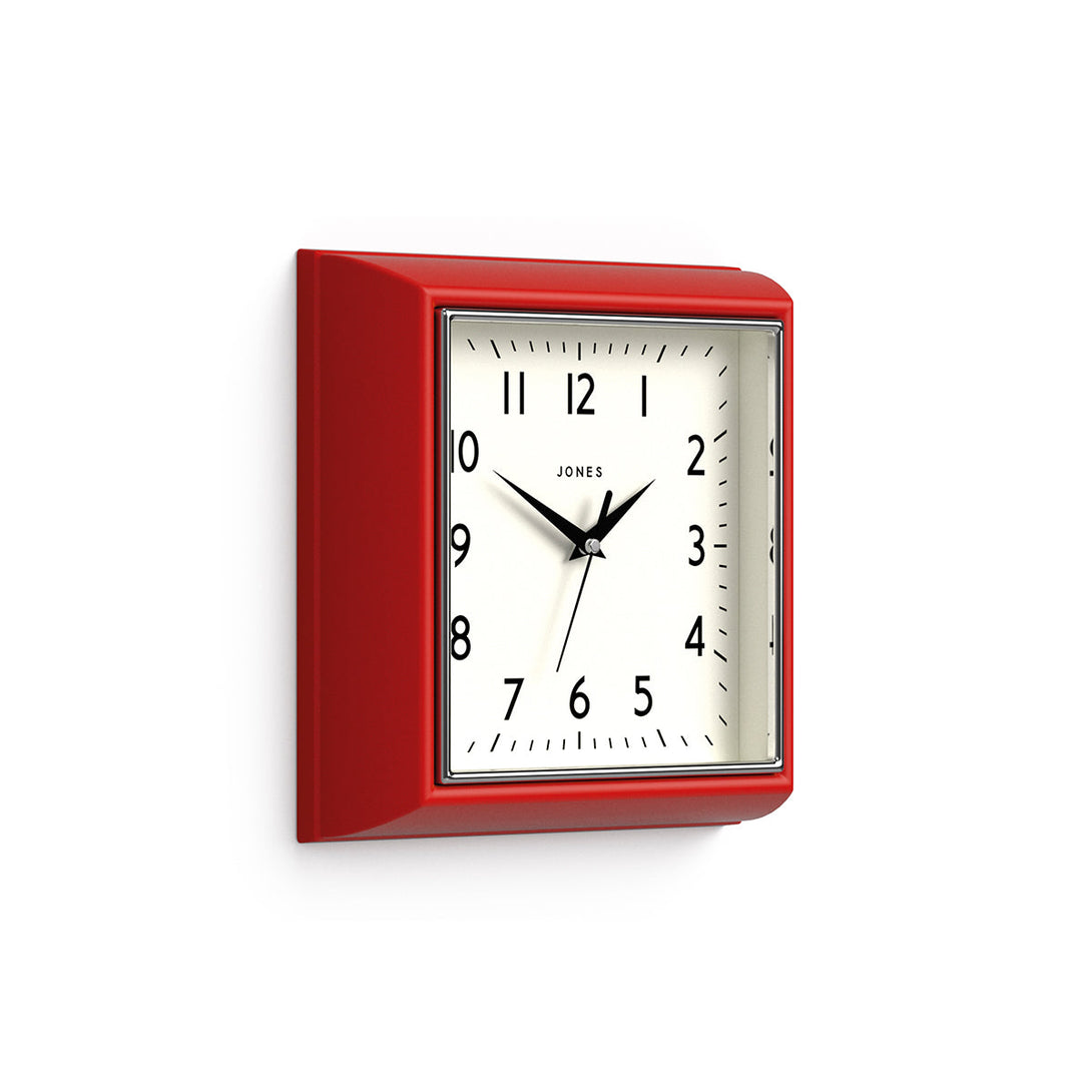 Skew - Mustard wall clock by Jones Clocks in red with a square retro style case and a contemporary dial - JMUST741R